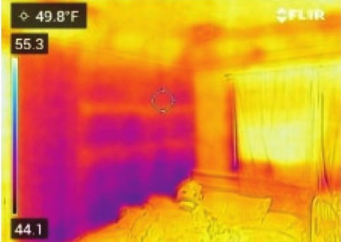 Thermal imaging showing heat loss in a residential envelope